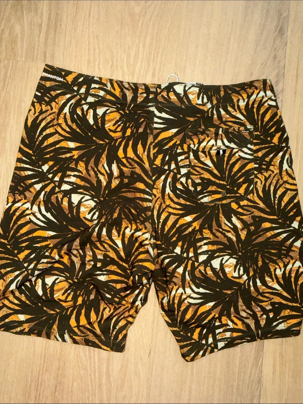 Hurley Orange and Black Palm-Print Swim Shorts size 34”